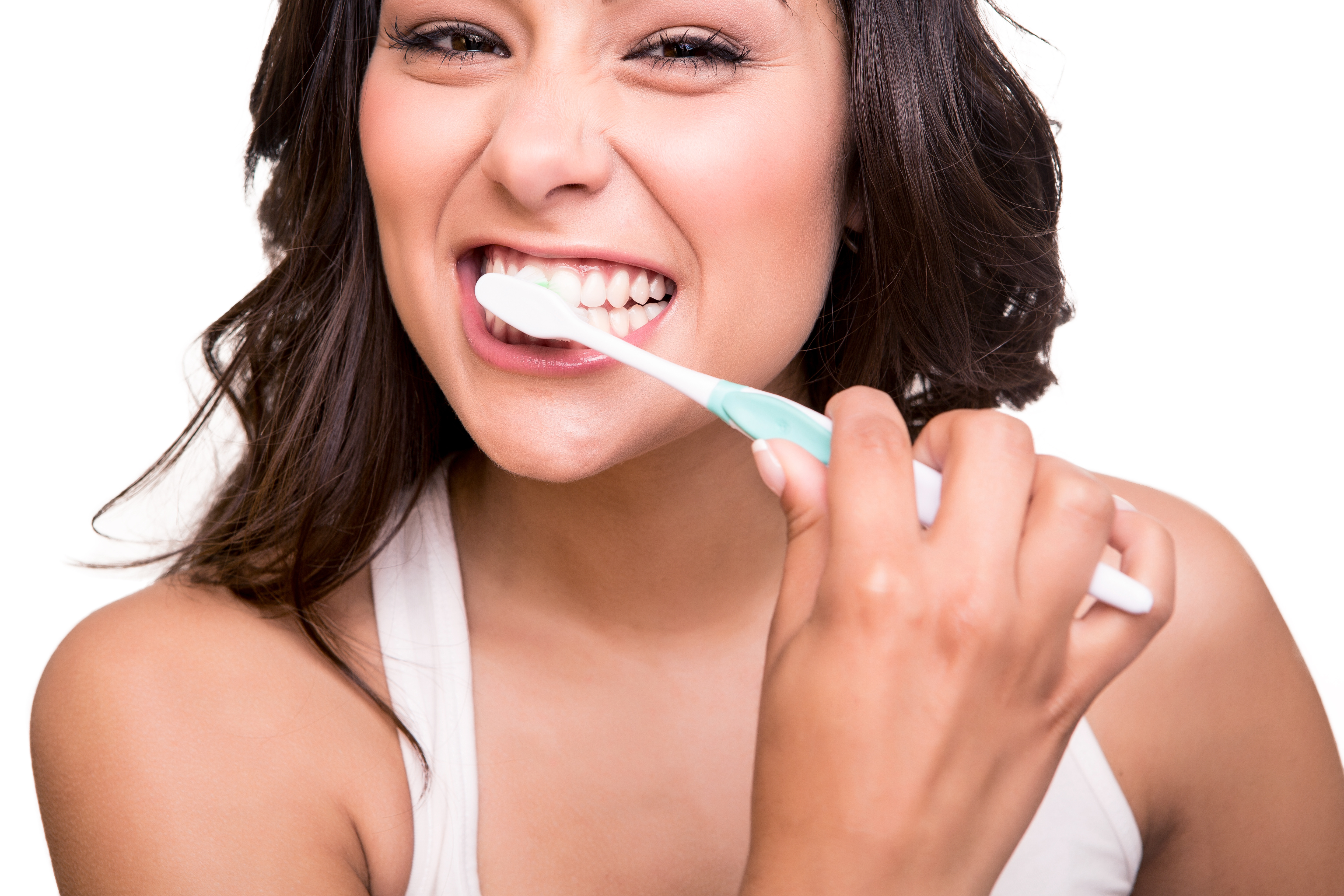 Woman holding a tooth brush