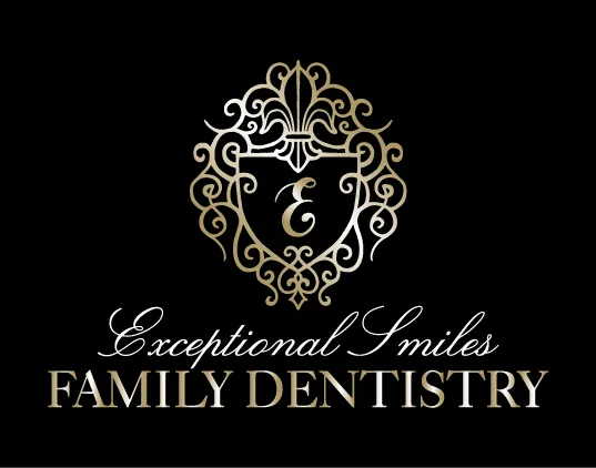 Ornate logo for Exceptional Smiles Family Dentistry featuring an elegant decorative emblem with the letter